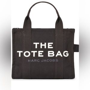 The small tote bag in black.